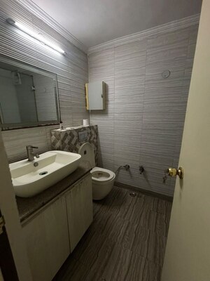 Bathroom in 3 BHK Builder Floor at Hemkunt Colony – for Sale