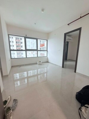 Living Room in 1 BHK Apartment at Piramal Vaikunth, Balkum Pada – for Rent
