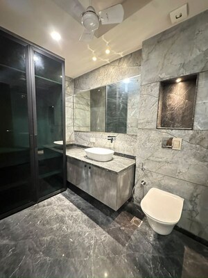 Bathroom in 4 BHK Apartment at East Of Kailash – for Sale