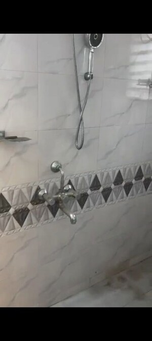 Bathroom in 2 BHK Apartment at Sudarshan Sky Garden, Ghodbunder Road – for Rent