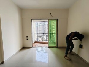 Living Room in 1 BHK Apartment at Purshottam Nayan, Ghodbunder Road – for Rent