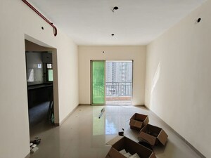 Living Room in 1 BHK Apartment at Purshottam Nayan, Ghodbunder Road – for Rent