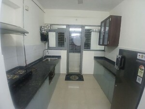 Kitchen in Studio Apartment at Amanora Metro Tower, Hadapsar – for Rent