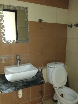 Bathroom in 3 BHK Apartment at Mahagun My Woods, Sector 16c Greater Noida – for Rent