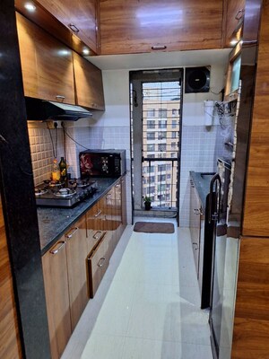 Kitchen in 1.5 BHK Apartment at Hubtown Gardenia, Mira Road – for Sale