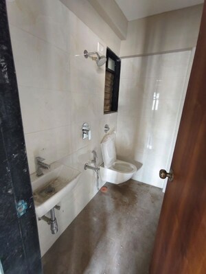 Bathroom in 1 BHK Apartment at Haware Intelligentia Vector, Kasarvadavali – for Rent