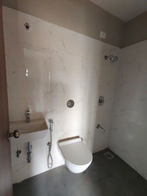 Bathroom in 1 BHK Apartment at Haware Intelligentia Vector, Kasarvadavali – for Rent