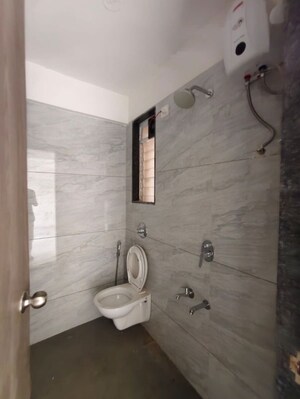 Bathroom in 1 BHK Apartment at Haware Intelligentia Vector, Kasarvadavali – for Rent