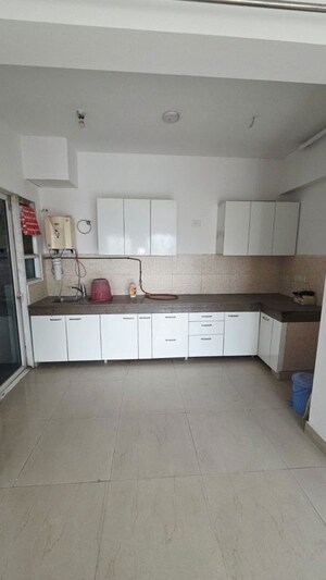 Kitchen in 3 BHK Apartment at ABA Cherry County, Tech Zone 4 Greater Noida – for Rent