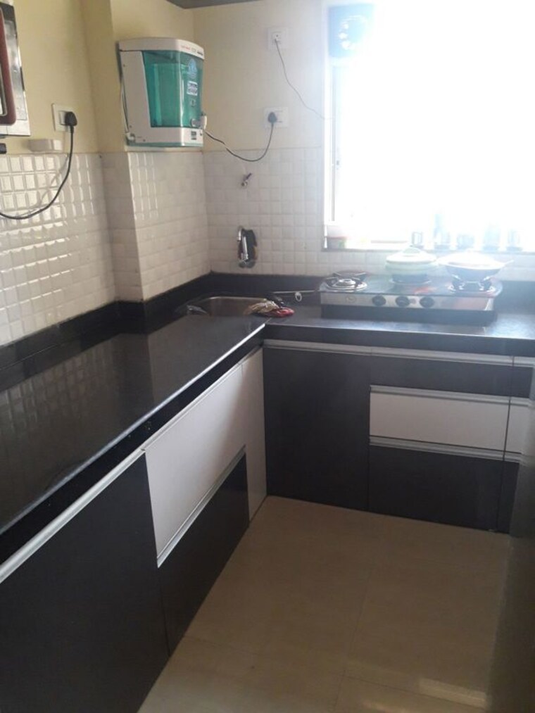 Kitchen, rosa-elite 1 Bedroom 450 Sq.Ft. Apartment In Bhayandarpada Thane 10688778