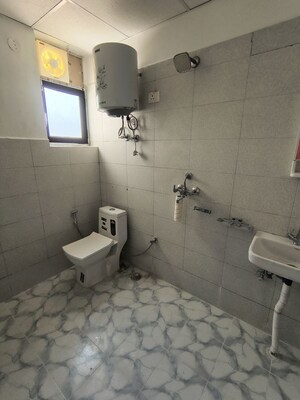 Bathroom in 2 BHK Apartment at Bedarwals Sixty Three Golf Drive, Sector 63 – for Rent