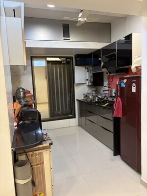 Kitchen in 3 BHK Apartment at Samarpan CHS, Mira Road – for Rent