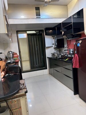 Kitchen in 3 BHK Apartment at Samarpan CHS, Mira Road – for Rent