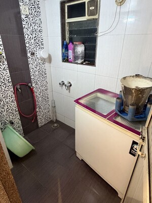 Bathroom in 3 BHK Apartment at Samarpan CHS, Mira Road – for Rent