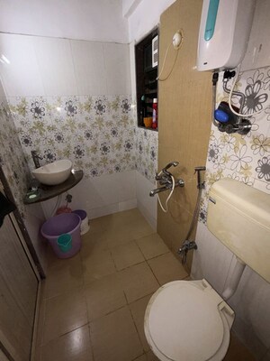Bathroom in 3 BHK Apartment at Samarpan CHS, Mira Road – for Rent