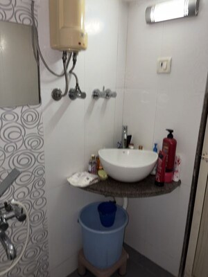 Bathroom in 3 BHK Apartment at Samarpan CHS, Mira Road – for Rent