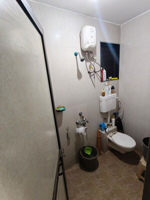 Bathroom in 1 BHK Apartment at KM Horizon Flora, Ghodbunder Road – for Rent