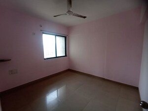 Living Room in 2 BHK Apartment at Pushpanjali Heights, Owale – for Rent