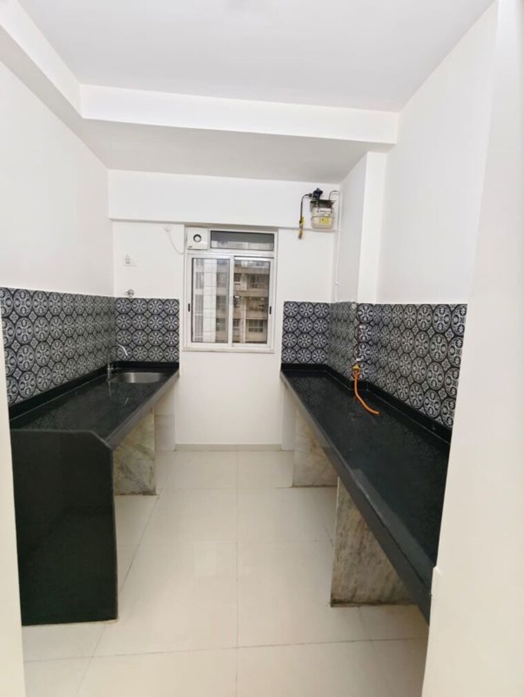 Kitchen, purshottam-nayan 1 Bedroom 450 Sq.Ft. Apartment In Ghodbunder Road Thane 10688824