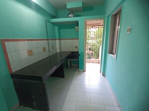 Kitchen in 1 BHK Apartment at Soham Parijat Gardens, Ghodbunder Road – for Rent