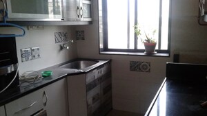 Kitchen in 2 BHK Apartment at Adani Western Heights Sky Apartments, Andheri West – for Sale