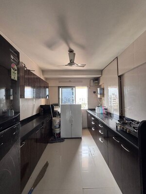 Kitchen in 3 BHK Apartment at Rajveer Apartment Andheri, Andheri West – for Rent