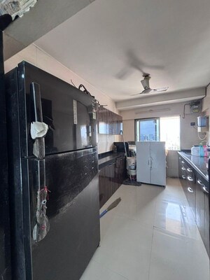 Kitchen in 3 BHK Apartment at Rajveer Apartment Andheri, Andheri West – for Rent