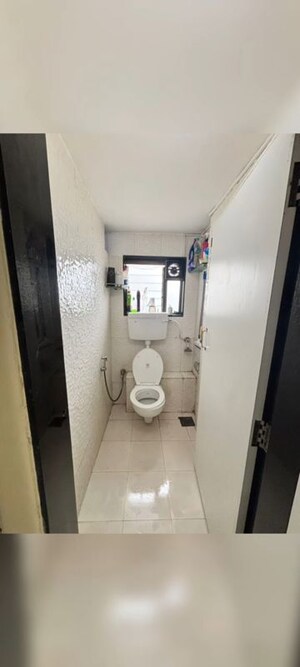 Bathroom in 1 BHK Apartment at Gokhale Road – for Sale