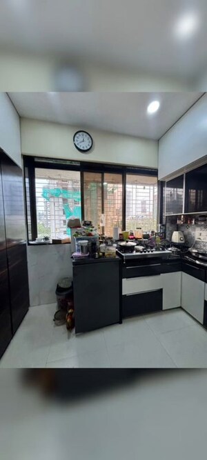 Kitchen in 1 BHK Apartment at Gokhale Road – for Sale