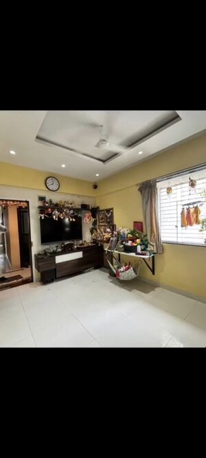 Living Room in 1 BHK Apartment at Gokhale Road – for Sale