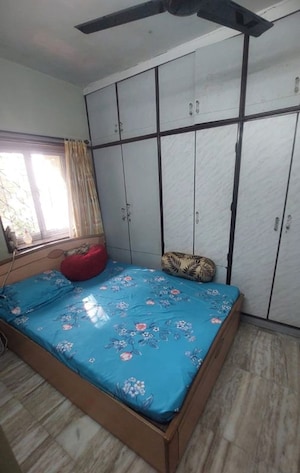 Bedroom in 2 BHK Apartment at Riddhi Garden, Malad East – for Rent