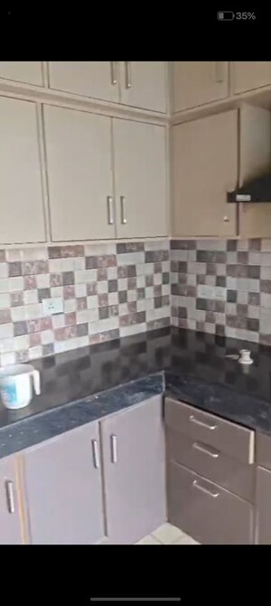 Kitchen in 2.5 BHK Apartment at Nilaya Greens, Raj Nagar Extension – for Rent
