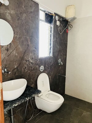 Bathroom in 3 BHK Apartment at Mokal Pushp Pinnacle, Kharghar – for Rent