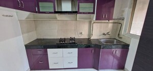 Kitchen in 2.5 BHK Apartment at Paras Tierea, Sector 137 – for Sale