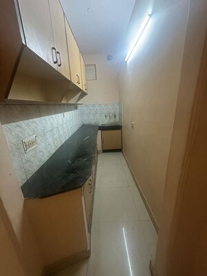 Kitchen in 1.5 BHK Apartment at Jangpura – for Rent