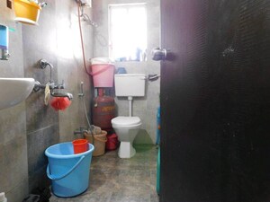 Bathroom in 2 BHK Apartment at Sai Raj Heights, Punawale – for Rent