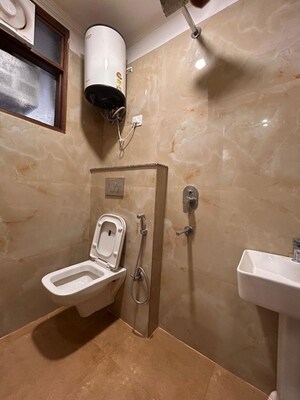 Bathroom in 2 BHK Apartment at Palm Residency Chhatarpur, Chattarpur – for Rent