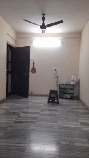 Living Room in 1 BHK Apartment at Raheja Township, Malad East – for Sale