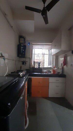 Kitchen in 1 BHK Apartment at Raheja Township, Malad East – for Sale