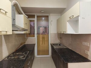 Kitchen in 2 BHK Apartment at Mahagun Mirabella, Sector 79 – for Sale
