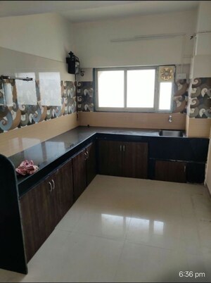 Kitchen in 2 BHK Apartment at Powai Cosmopolitan CHS, Powai – for Rent