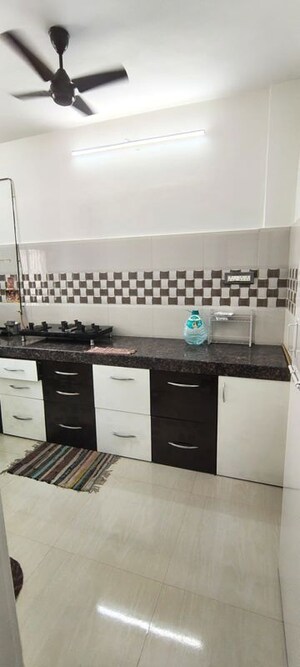 Kitchen in 1 BHK Apartment at Dheeraj Uphar CHS. LTD., Malad East – for Rent