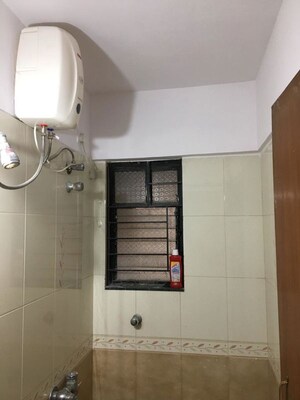 Bathroom in 2 BHK Apartment at Kapil Malhar Apartment, Baner – for Rent