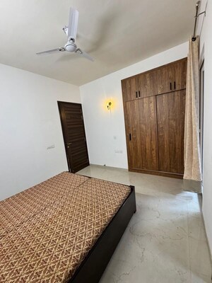 Bedroom in 3 BHK Builder Floor at Smart World Orchard, Sector 61 – for Rent