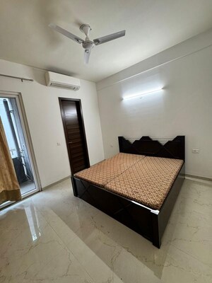 Bedroom in 3 BHK Builder Floor at Smart World Orchard, Sector 61 – for Rent