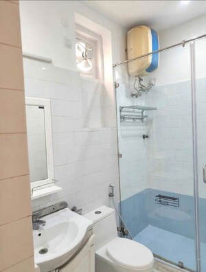 Bathroom in 3 BHK Builder Floor at Pamposh Enclave – for Rent