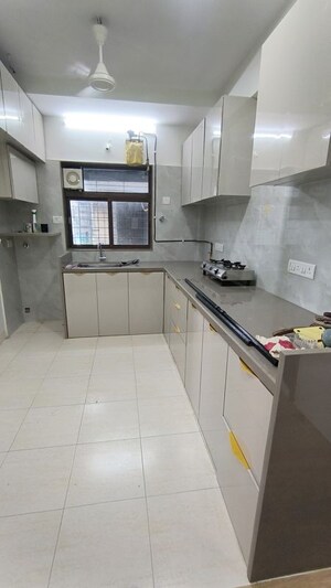 Kitchen in 2 BHK Apartment at Dadar West – for Rent