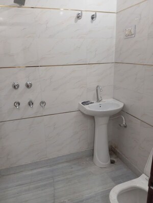 Bathroom in 2 BHK Builder Floor at Dwarka Mor – for Sale
