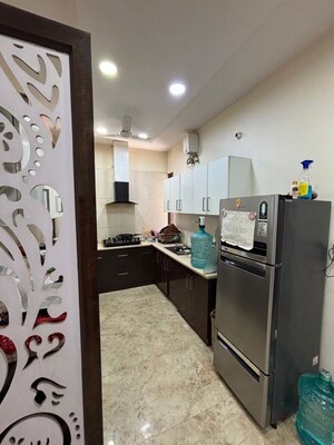 Kitchen in 1.5 BHK Builder Floor at Hong Kong Bazaar, Sector 57 – for Rent