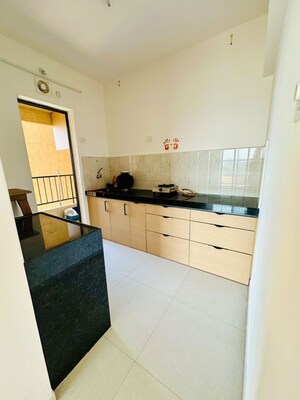 Kitchen in 2 BHK Apartment at Duville Riverdale Heights, Kharadi – for Rent